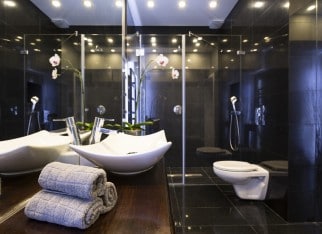 Black bathroom with shower